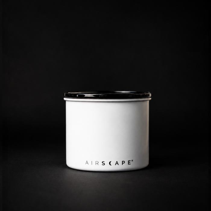 Airscape Kaffeedose aus Edelstahl mit luftdichtem Verschluss und transparentem Fenster, ideal zur Frischebewahrung von Kaffee.